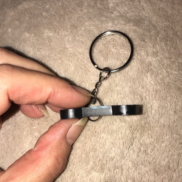 Custom epoxy mini bone 🦴 keychain green with blue dots - Picture 3 of 3